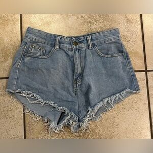Blue Jean Shorts with Frayed Hem and Vintage Look
